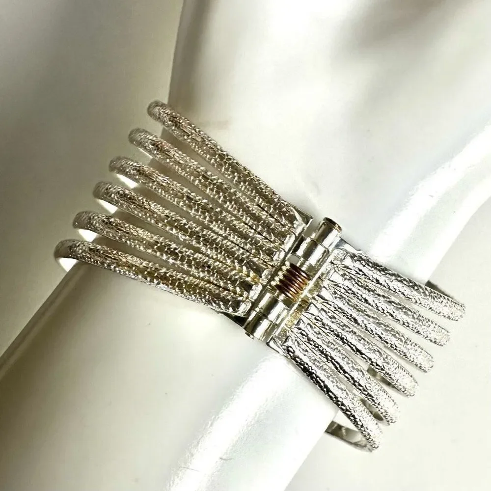 Silver tone textured hinged wide bracelet